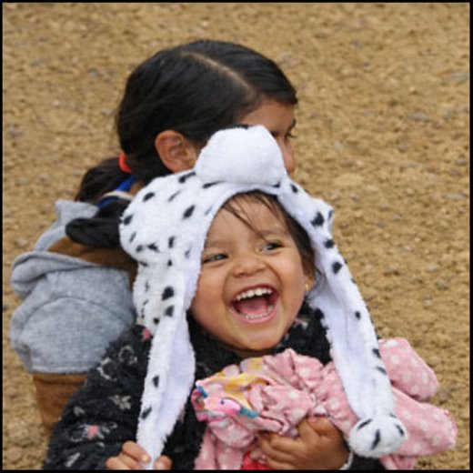 A laughing Honduran child — pure joy.